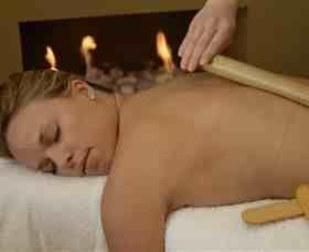 One hour warm bamboo massage with light and deep pressure massage techniques $80