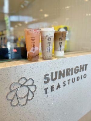 Strawberry Yakult with Jasmine Tea Jelly, Hokkaido Milk Tea with Cheese Foam & Honey Boba, and Coffee Oolong Milk Tea with Cream Pudding