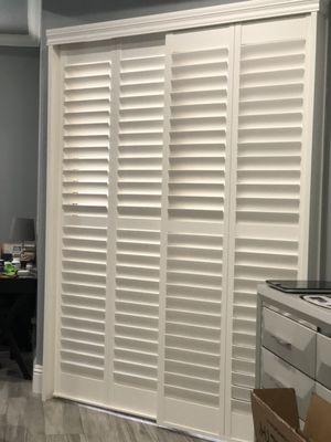 Master bedroom slider shutters.