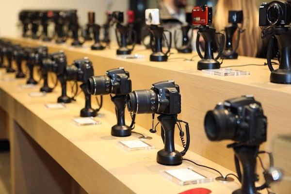 Full line of Canon and Nikon cameras and lenses on display everyday