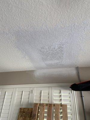 Repaired hole in ceiling