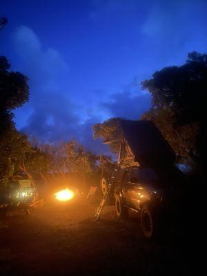 Campsite with fire at night