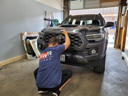 Our Calibration tech preparing for a windshield ADAS recalibration.