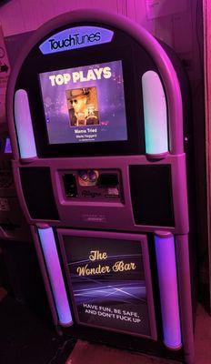 Our jukebox is Touch Tunes. Compostable with the Touch Tunes app!