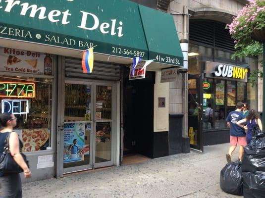 Storefronts including the entrance to Active Staffing Services