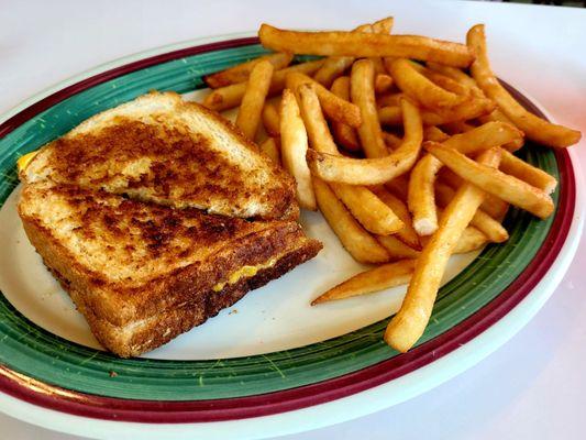 My wife enjoyed her grilled cheese with sautéed onions