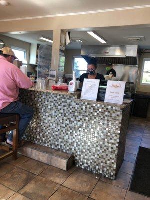 Inside counter and open kitchen