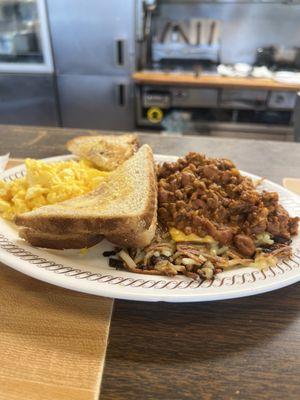 Smothered, covered and capped hash brown. It was amazing. This is a good Waffle House around 2pm on a Saturday afternoon with Cheese 'n Eggs