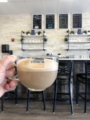 Latte with new coffee bar in the background