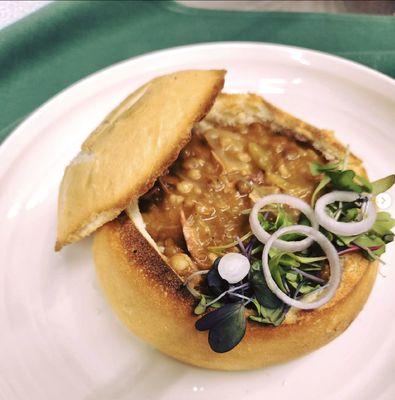 Rabbit Stew with lentils and barley served in a bread bowl