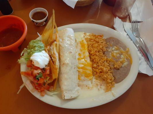 Chicken burrito, tamale, and cheese enchilada.