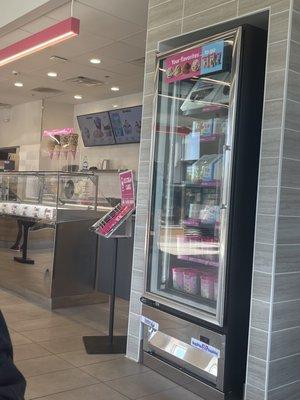 A fully stocked ice cream(cake) freezer.