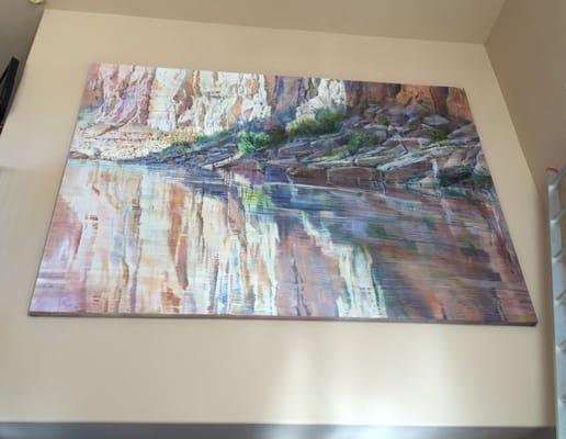 The picture doesn't do this painting (Merrill Mahaffey) justice, but it is perfect for our wall!!