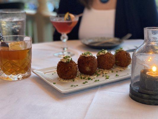 Gouda short rib arancini. I Put a Spell on You. House Smoked Old Fashion.