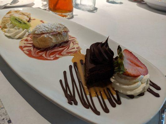 Dessert sampler with cherry studel, strawberry eclair and chocolate too!