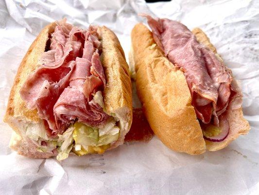 Italian combo on sub roll with lettuce, onions, pickles, vinegar and hot peppers