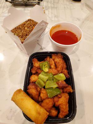 Sweet and sour chicken and fried rice instead of white with a veggie spring roll