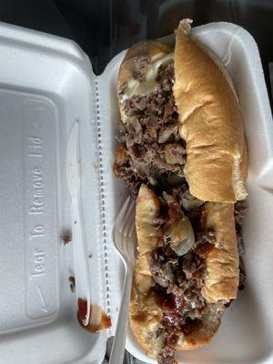 Cheesesteak from a food truck. Real people from Philly.