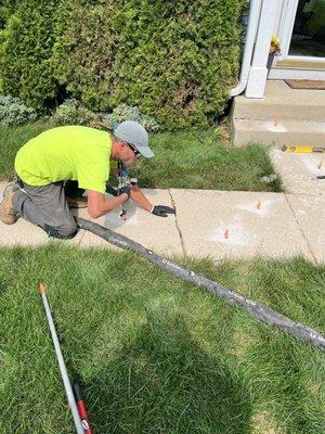 Before pic, crack in sidewalk