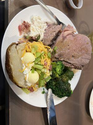 My huge prime rib with a baked potato and broccoli