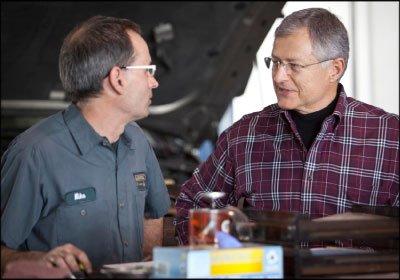 Mr. Keller working with one of our expert technicians at Keller Bros Auto Repair.