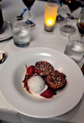 Baked peach stuffed with oats and pine nuts and a side of gelato.