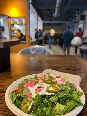 My veggie bowl with where you order in the background