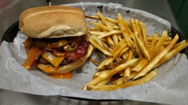 Hell's Bells Burger & Homecut Fries (cayenne seasoned burger, topped with pepperjack cheese, jalapenos, bacon and our atomic wing sauce)