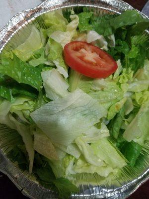 Extremely bare salad, one tomato, nothing else! Not even onions!