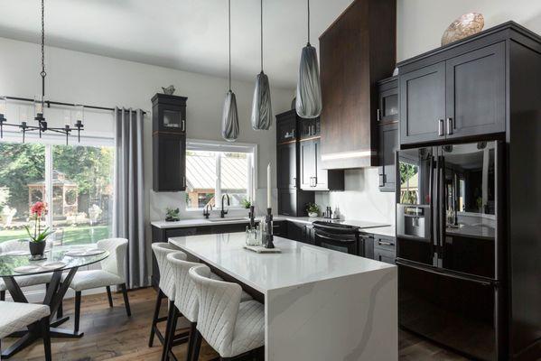 Silestone Classic Calacatta  quartz with waterfall and full height backsplash.