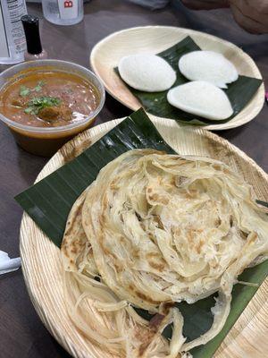 Idly, Paratha, and chicken curry