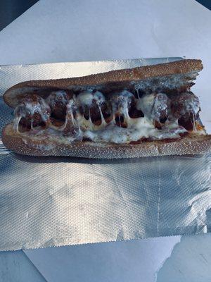 Yummy Italian Meatball Sandwich with Provolone Cheese.