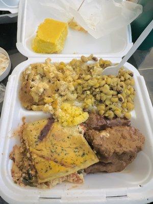 Lasagna (bottom left), kalebone (bottom right), mac and cheese (top left), black eyed peas (top right) and cornbread