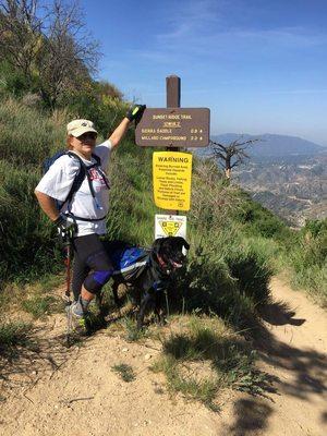 Dr. Gomez on trail with Hudson "puppy" her dog