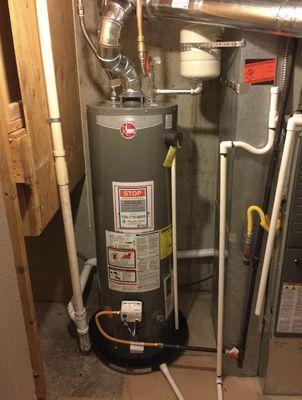 Rheem 40 Gal Gas Water Heater with an expansion tank, TPR valve, and drip pan installed in Parker, CO in Feb 2023 for $1800