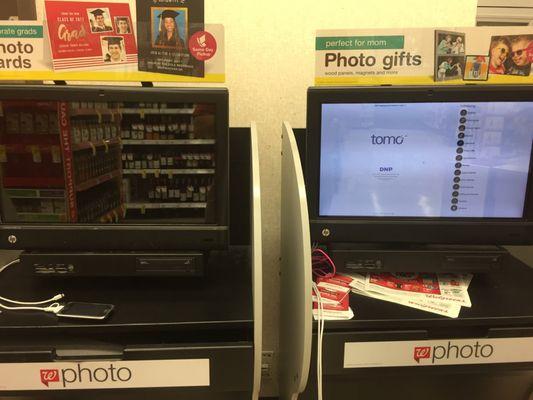 This is the photo kiosk, the one on the left won't turn on, the one on the right is perpetually booting up (going on 20min)...