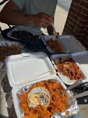 Kimchi Fried Rice, Spicy Stir Fried Udon Noodles, beef Bulgogi, and Crispy Pan Fried Duk Bok Ki