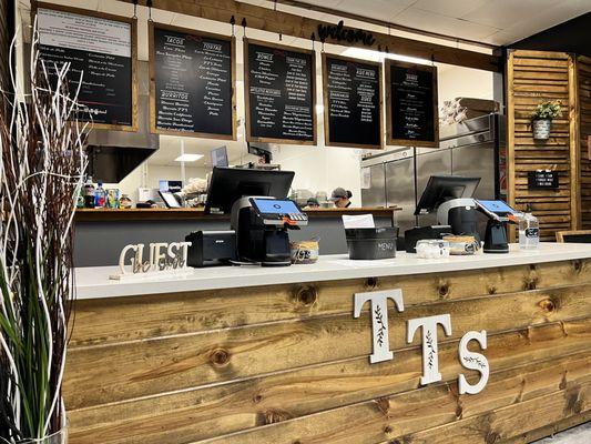 The Taco Shop front counter and menu boards