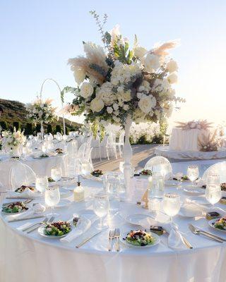 a rental- ghost chairs, dance floor & stage , blaire kimball design- florals