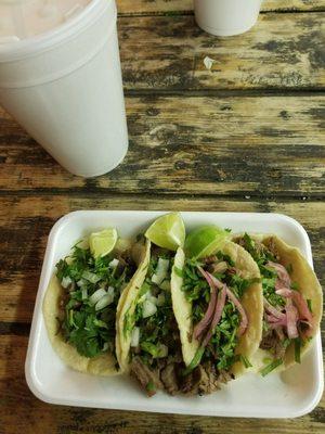 2 tacos de lengua and 2 de carne asada with large orcharta, please