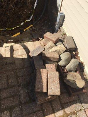 Patio Bricks and Rocks Removed but, Not Replaced/Refilled.