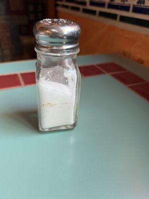 Dirty salt shaker with build up