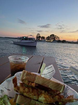 September evening eating a soft shell sandwich.