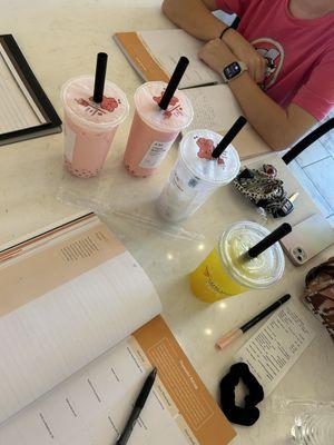 Orange crush with orange popping, taro tea, frozen strawberry with strawberry popping, strawberry milk with strawberry popping