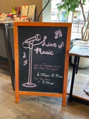 Signage for live music on Thursdays.