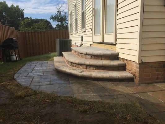 This house had an outdated red brick patio from when the house was built.  The new home owners wanted something a little more...