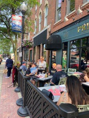 Prime outside patio with one of their excellent wait staff describing the fabulous food.