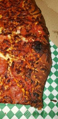 Burnt pizza.