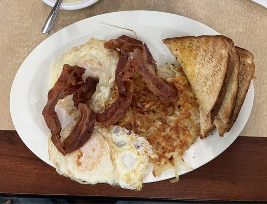 Bacon two eggs over medium toast & extra crispy hash browns.