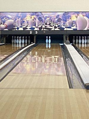 The bowling lanes in river lanes located in the voyager